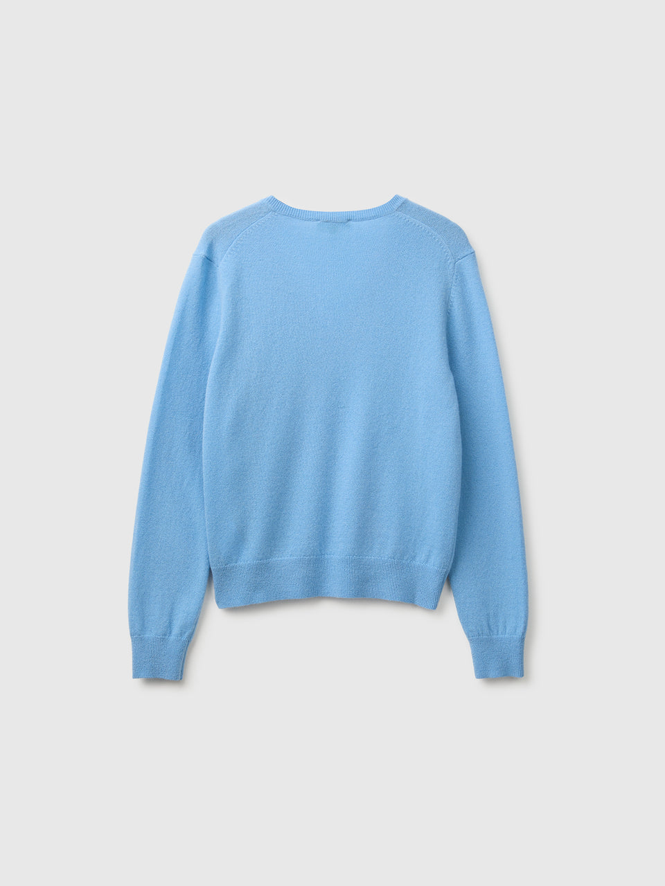 Camisola decote em V azul-claro em pura lã Merino - ucb_image_BS